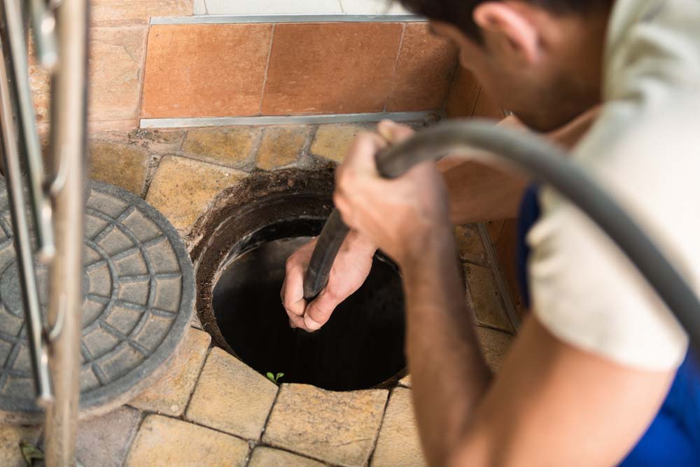 plumber cleaning sewer West Hartford, CT
